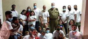 קצין מילואים ראשי וחיילי מילואים סייעו בחלוקת סלי מזון לנזקקים