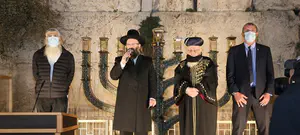נר ראשון של חנוכה בכותל המערבי: "להגדיל את האור"
