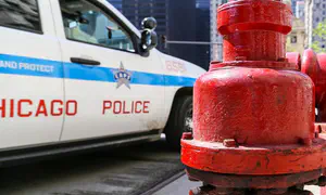 Chicago cop fired, charged after pinning down teen