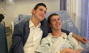 Brothers shot in Jerusalem attack reunited in hospital care