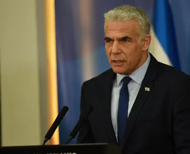 Lapid does not rule out having Tibi, Odeh as partners