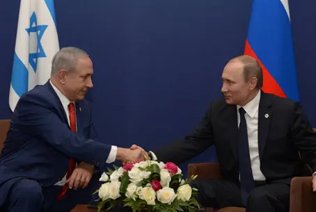 Нетаньяху и Путин. Рукопожатие в Париже