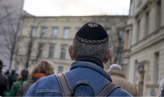 Kippah-clad man during Holocaust remembrance march
