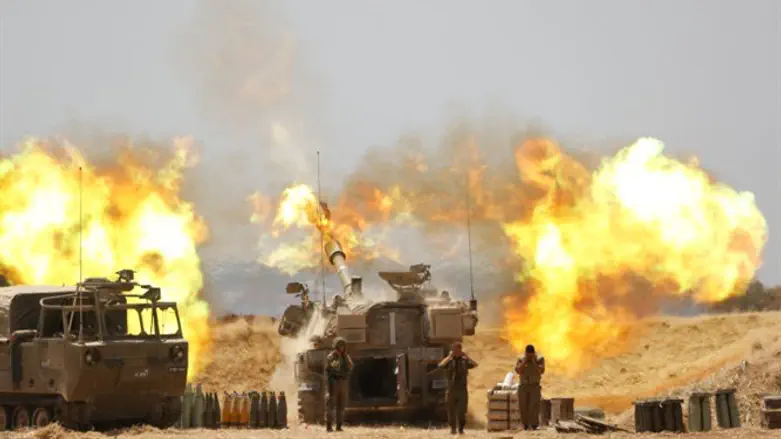 Israeli artillery units pound the Gaza Strip