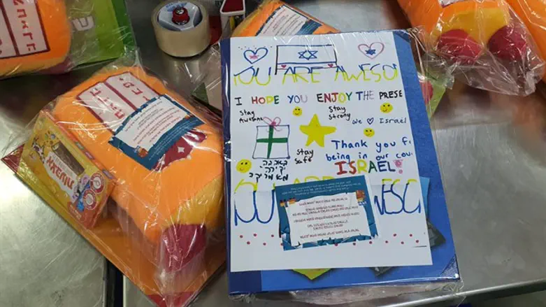 A package of toys with a caring note