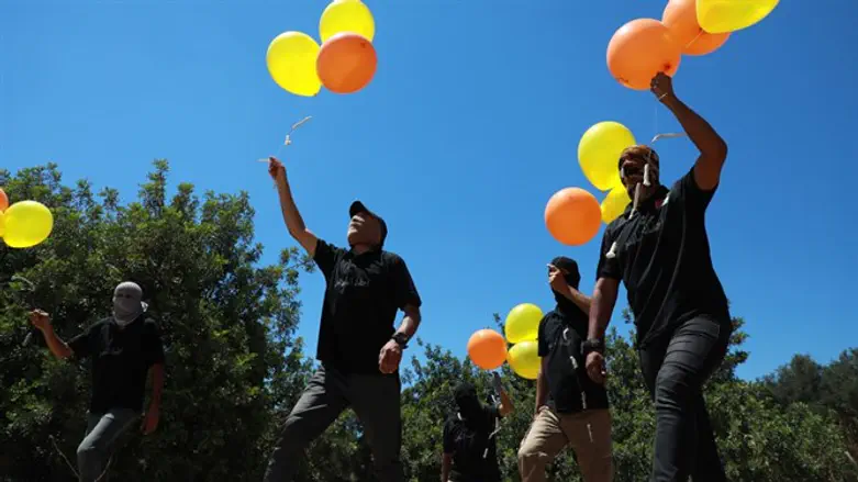 Terrorists fire incendiary balloons from Gaza