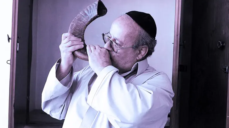 Afghanistan's last Jew, Zabulon Simantov, blows a ram's horn at the sole synagog