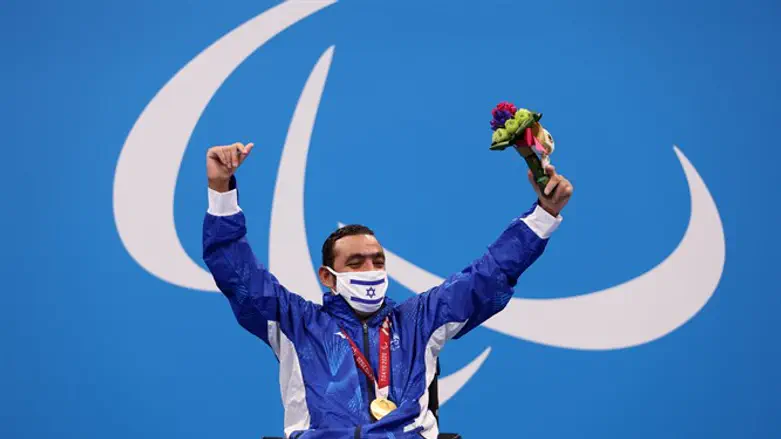 Iyad Shalabi reacts during a medal ceremony at the Tokyo Aquatics Centre at the 