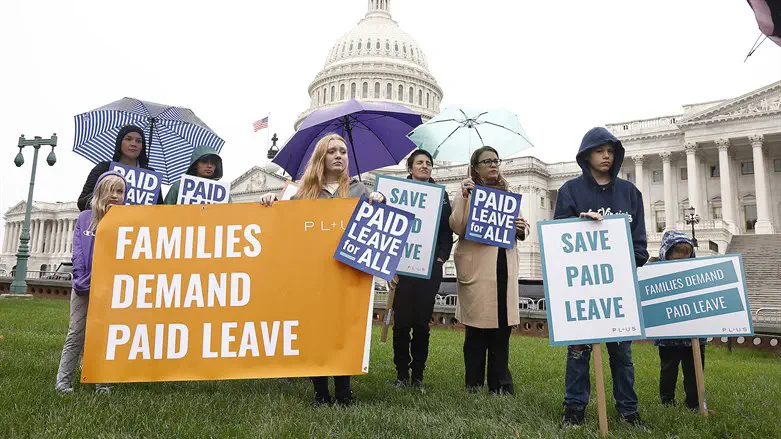 Vigil demanding paid leave