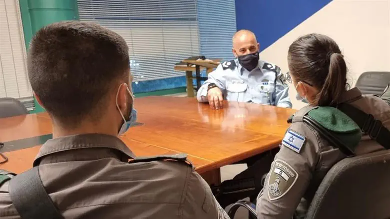 The two officers with the Jerusalem Police Chief