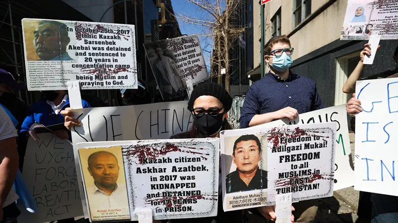 Protesters against China's policies toward the Uighurs demonstrate outside U.N.