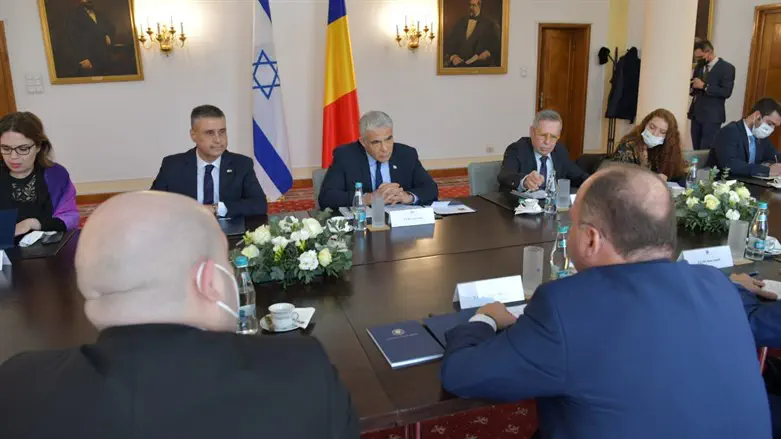 Lapid meets Romanian officials