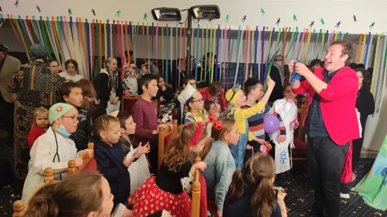 Ukrainian children celebrate Purim in Neptun, Romania
