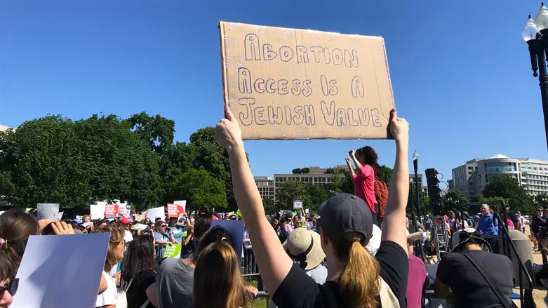 A handwritten sign at the Jewish Rally for Abortion Access on Tuesday, May 17th.