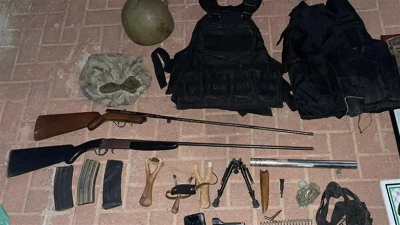 Some of the confiscated qeapons and equipment