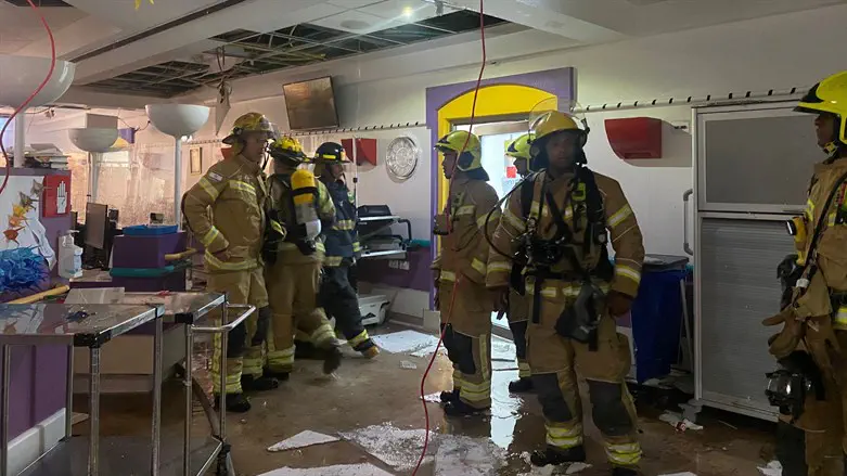 Firefighters after extinguishing the blaze at Schneider Children's Medical CEnter