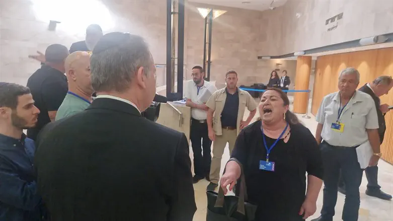 Bereaved families confront Likud committee member