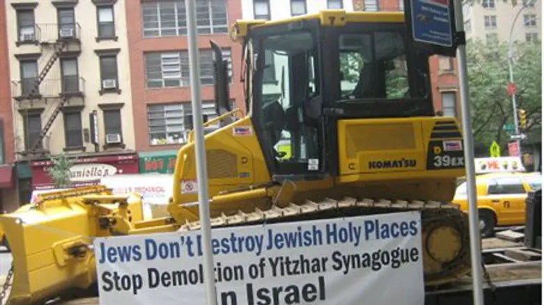 Bulldozer Protest Against Demolition