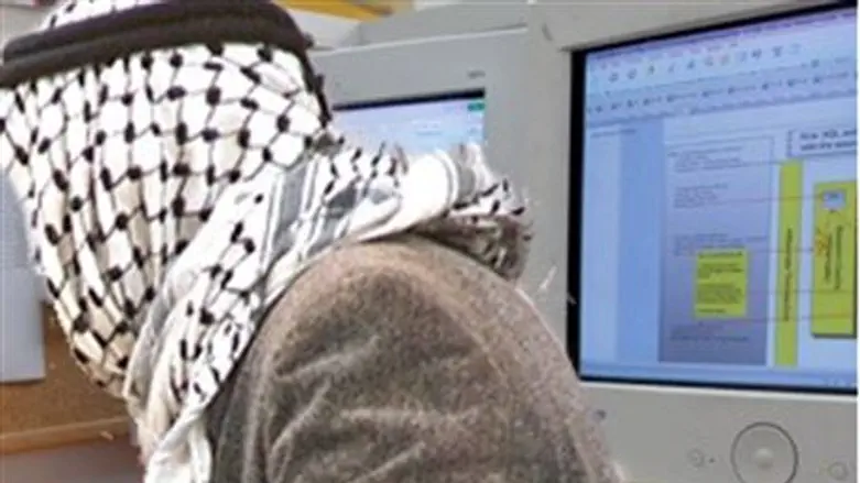 Arab in front of computer