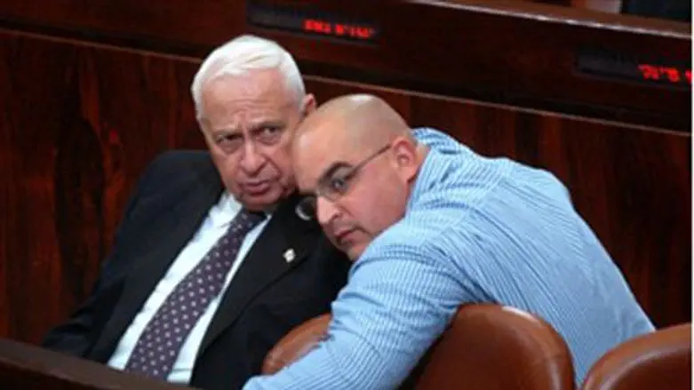 Former PM Sharon (left) with son Omri