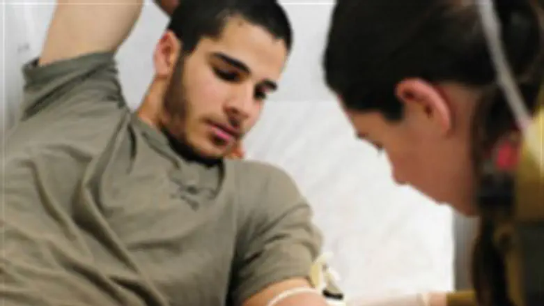 IDF soldier donating blood