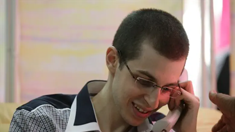 Shalit on phone with family.