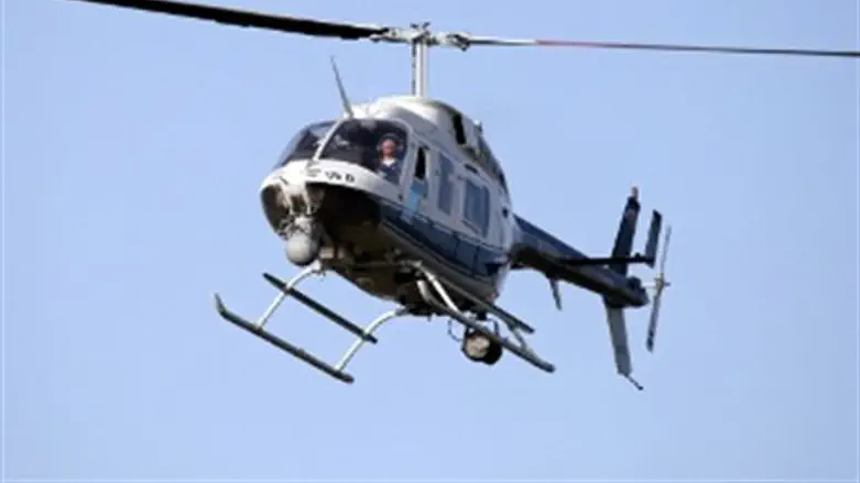 Helicopters patrolling Jerusalem