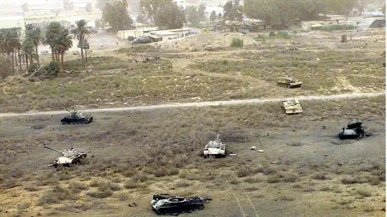 Destroyed Iraqi tanks in the field