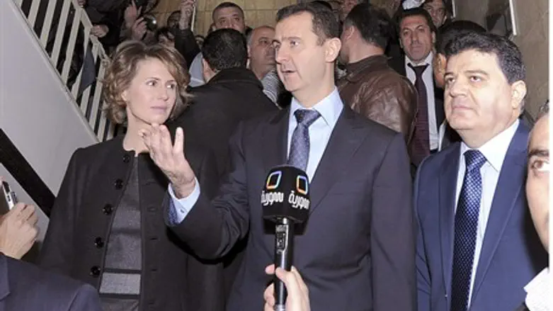 Syrian President Bashar Assad and wife Asma