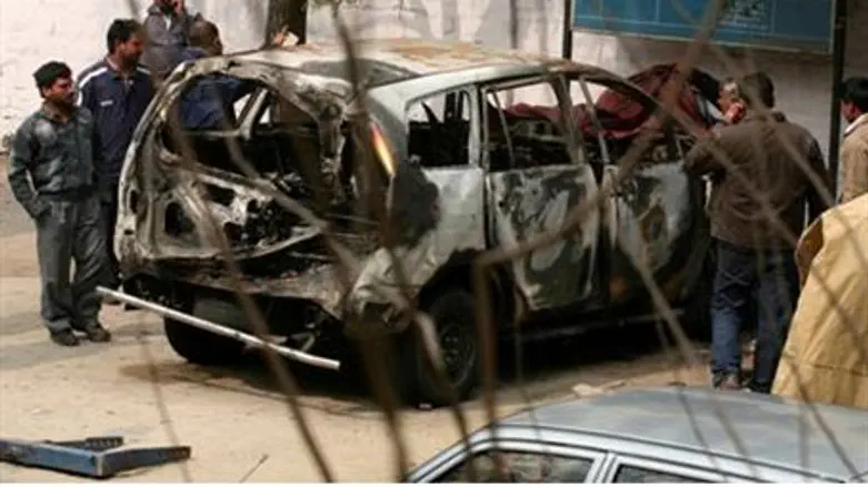 Remains of car in bomb attack in India bomb