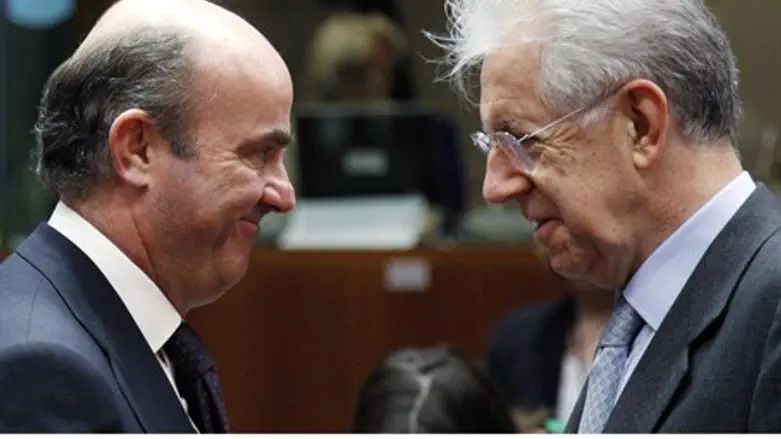 Monti and Spanish Finance Minister De Guindos