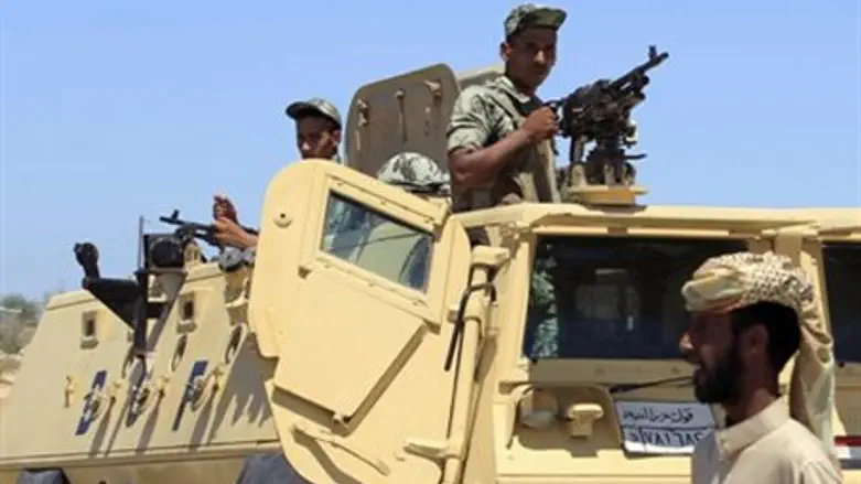 Egyptian soldiers and APC in Sinai