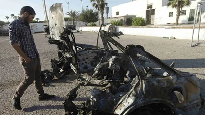 Remains of car that exploded in Tripoli