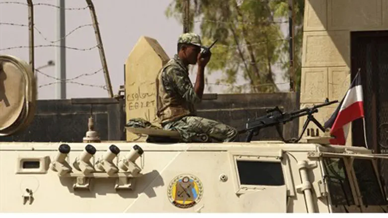 Egyptian soldier guards the border