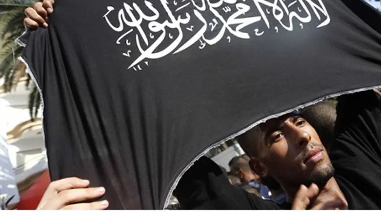 Protester holds Islamist flag at US Consulate
