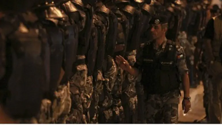 Jordanian police face price riot, Sept. 1.