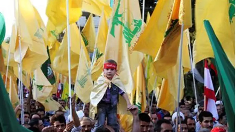  Supporters of Hizbullah leader Nasrallah wav