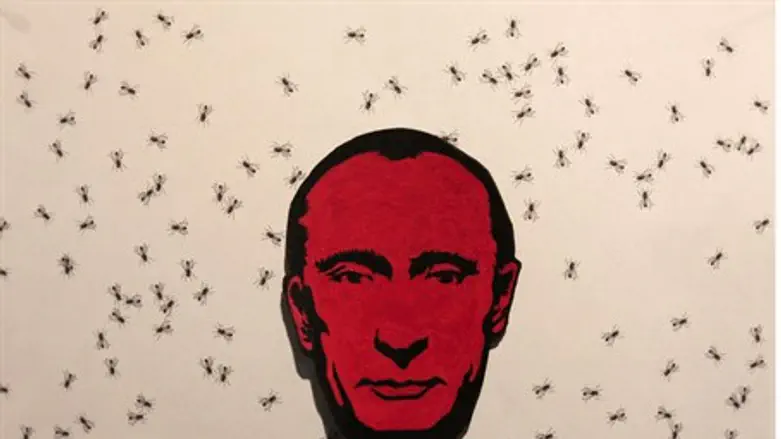 Putin swats opponents