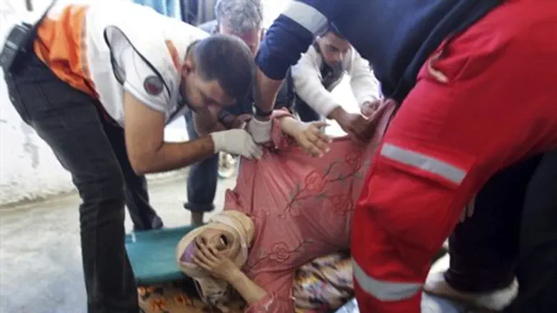 Medics with Gaza woman
