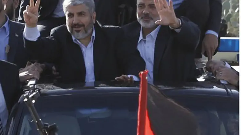 Hamas chief Khaled Mashaal and Hamas PM Ismai