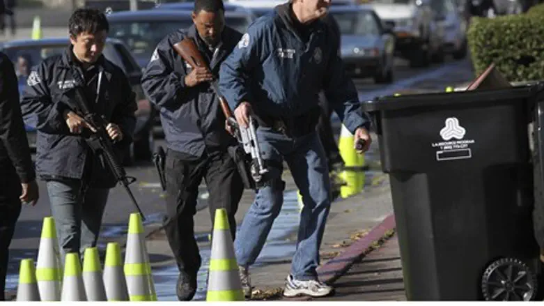 Police officers collect guns in California   