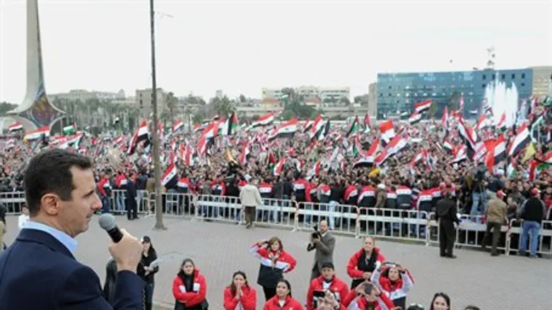 Assad speaks to supporters in 2012