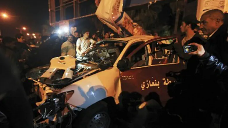 wreckage of a police car following Benghazi a