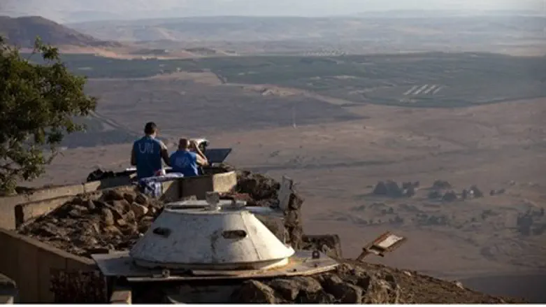 UN peacekeepers monitor the Syrian side of th