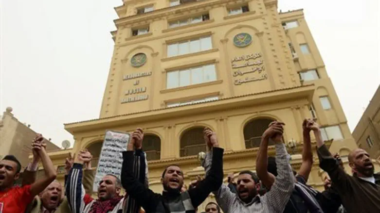 Muslim Brotherhood members gather in front th