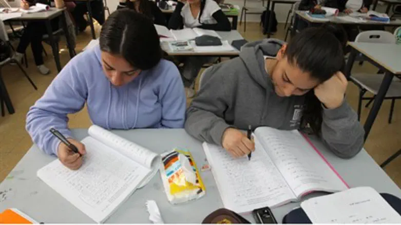 Students use workbooks (illustrative)