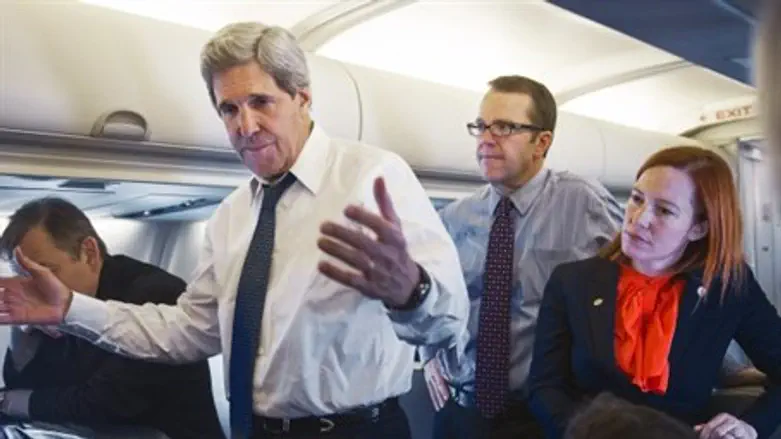 John Kerry, Jen Psaki at right (file)