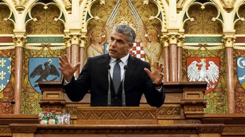Lapid speaks in the Hungarian parliament