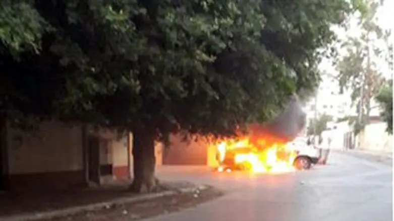 Burning car in front of the Russian embassy i
