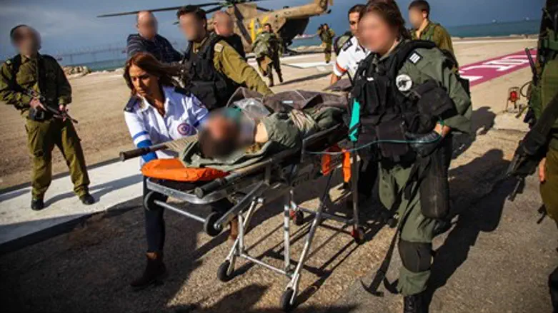 Injured soldier is evacuated following traini